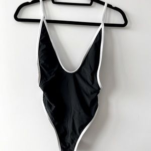 One piece black and white bathing suit